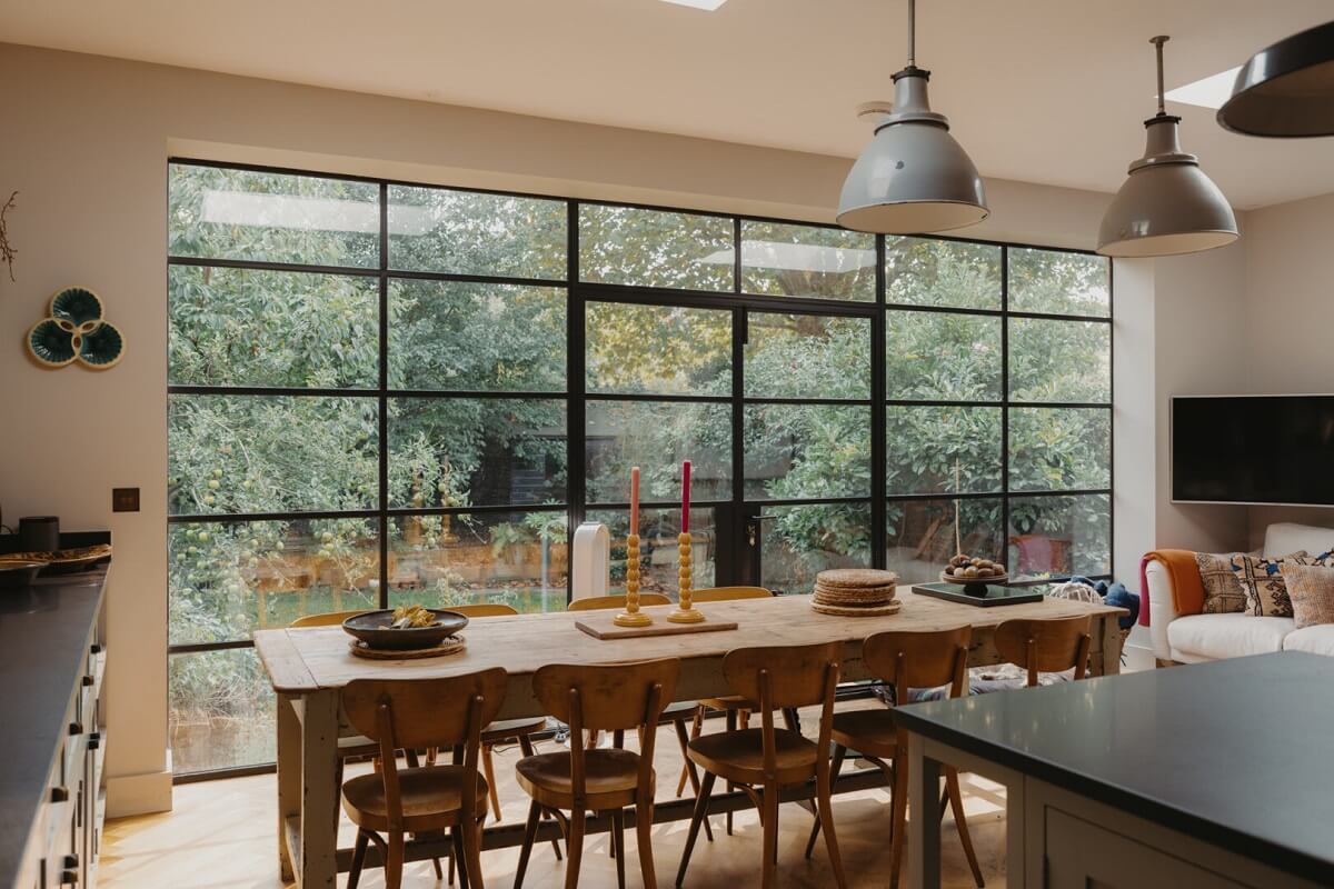 Original Details and a Modern Extension in a London House 13 steel glass windows large wooden dining table