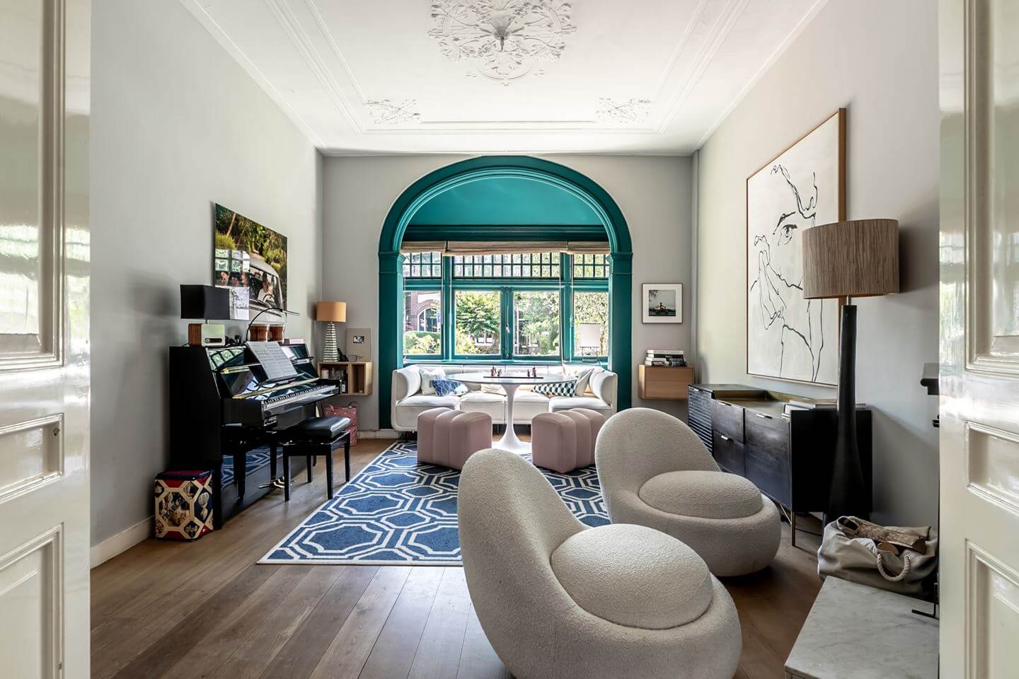 A Beautiful Monumental Villa with Green Color Accents 1 teal green bay with stained glass