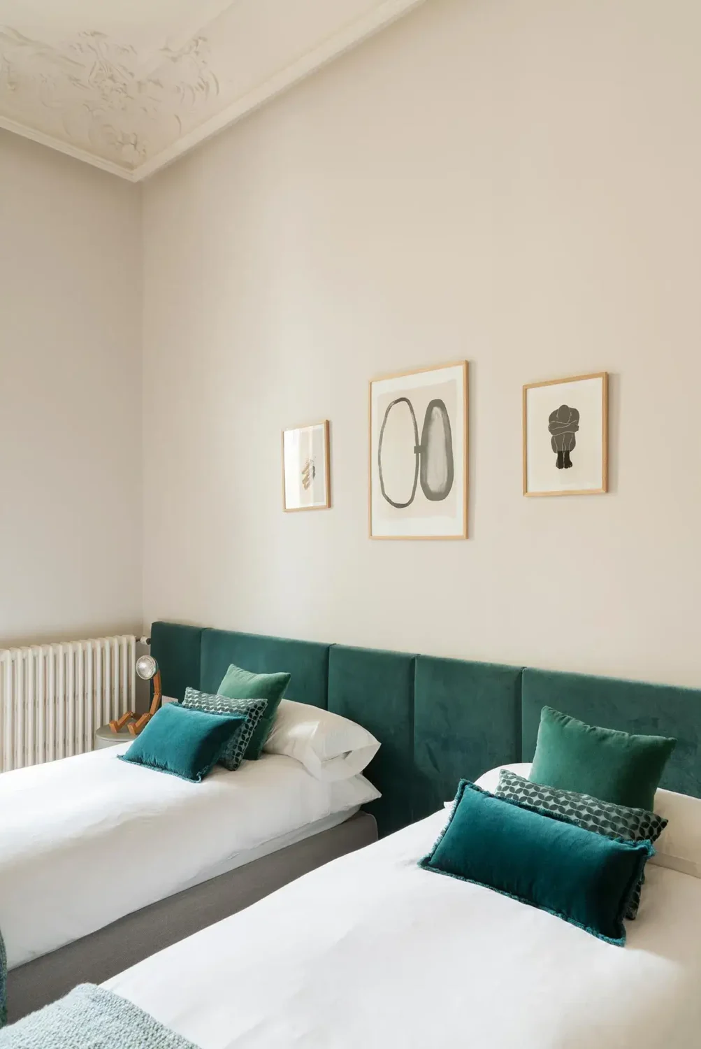 An Eclectic Mix of Modernist Elements and Luxurious Finishes in Barcelona 11 twin bedroom green velvet headboard