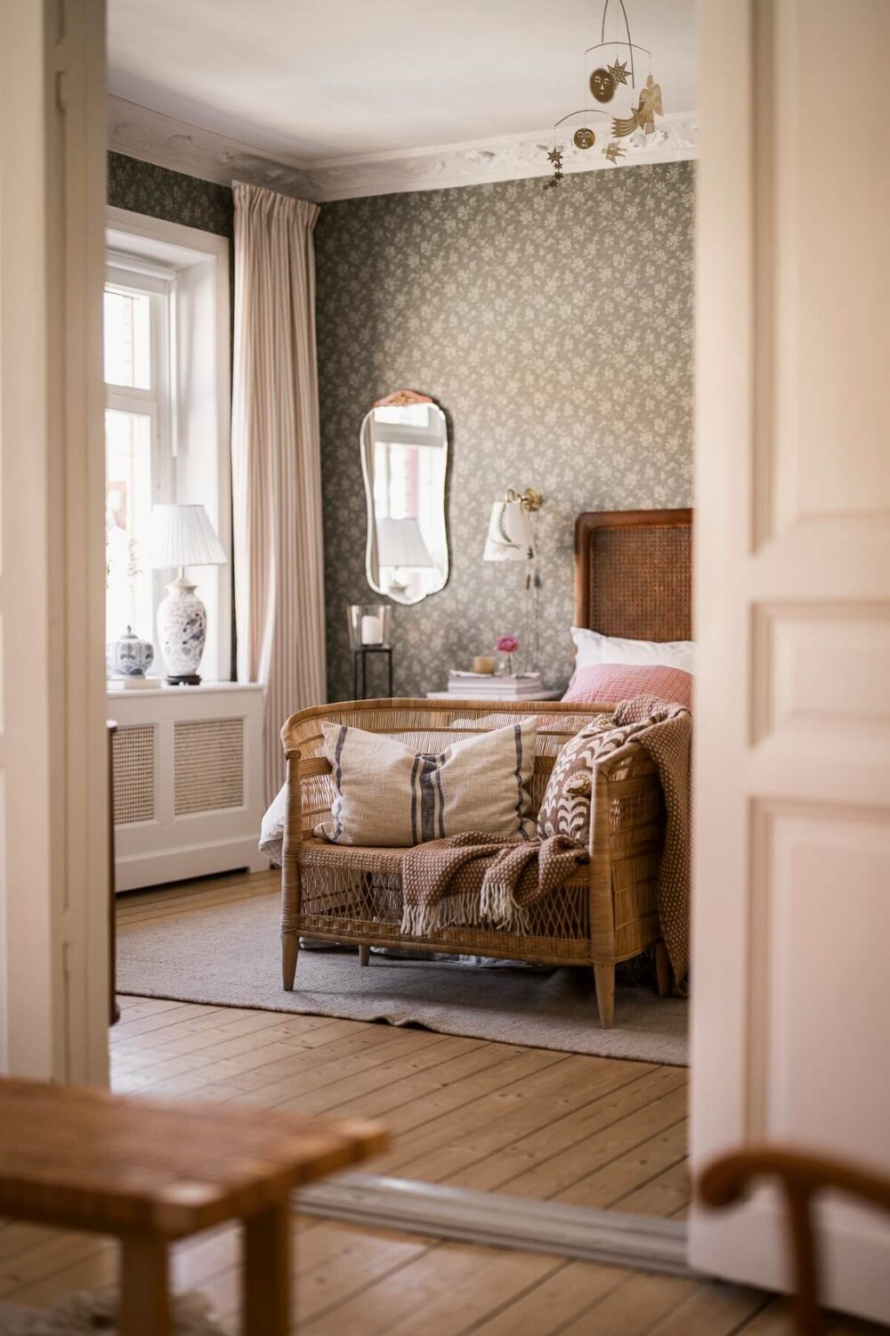 Hannes Mauritzson's Warm Yellow Hygge Apartment in Sweden 9 view into bedroom
