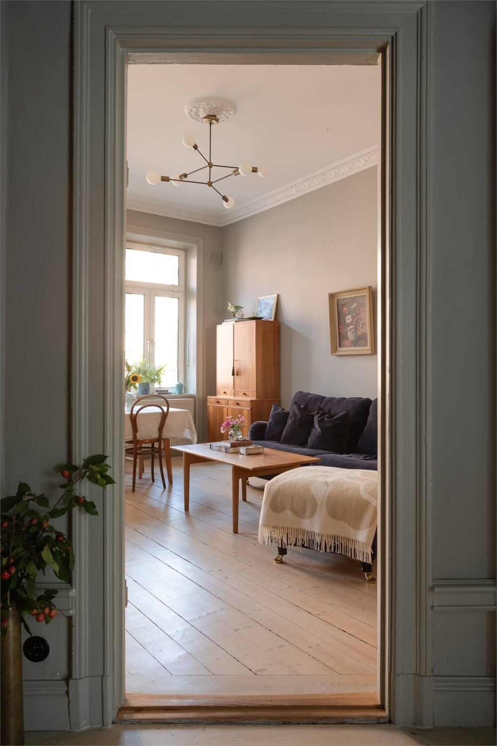 A Turn-of-the-Century Apartment with a Dark Blue Bedroom - Revisited 4 view into living room