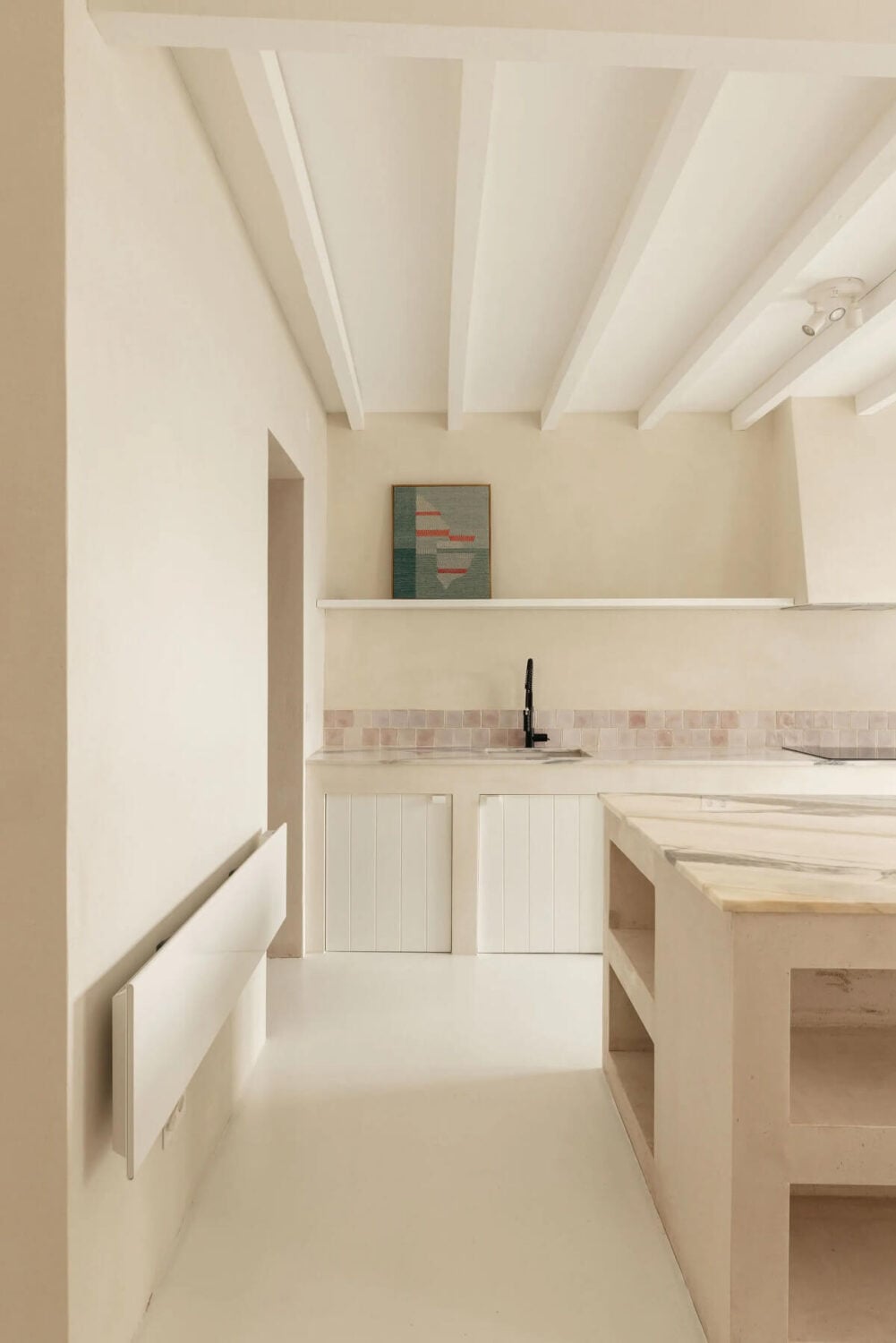 A Serene Minimalistic Townhouse in Portugal 7 white kitchen