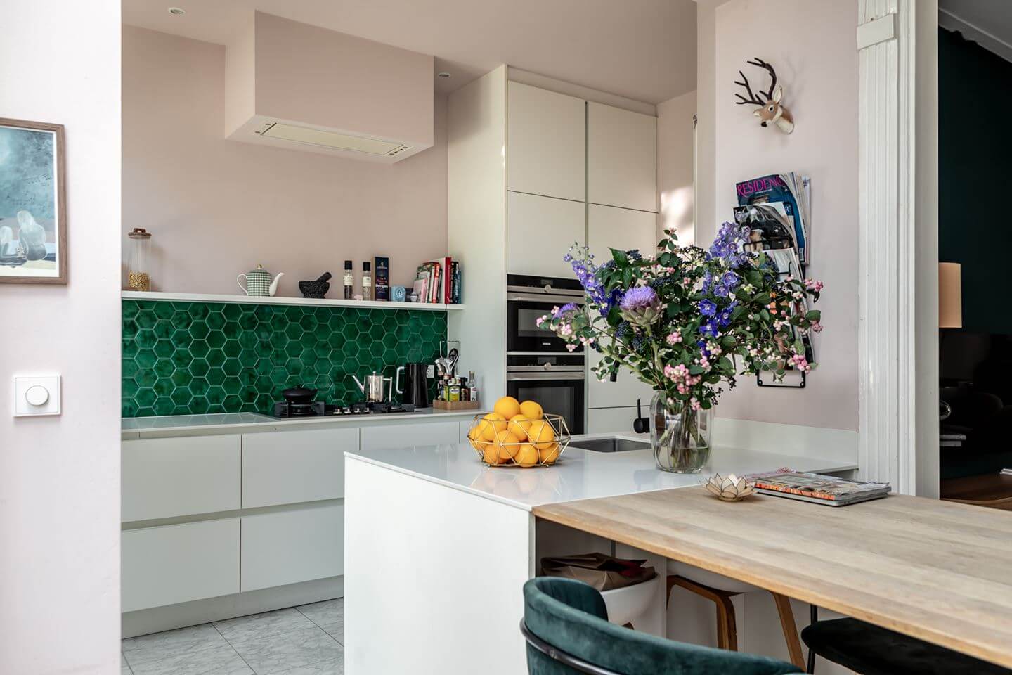 A Beautiful Monumental Villa with Green Color Accents 9 white kitchen with green tiles