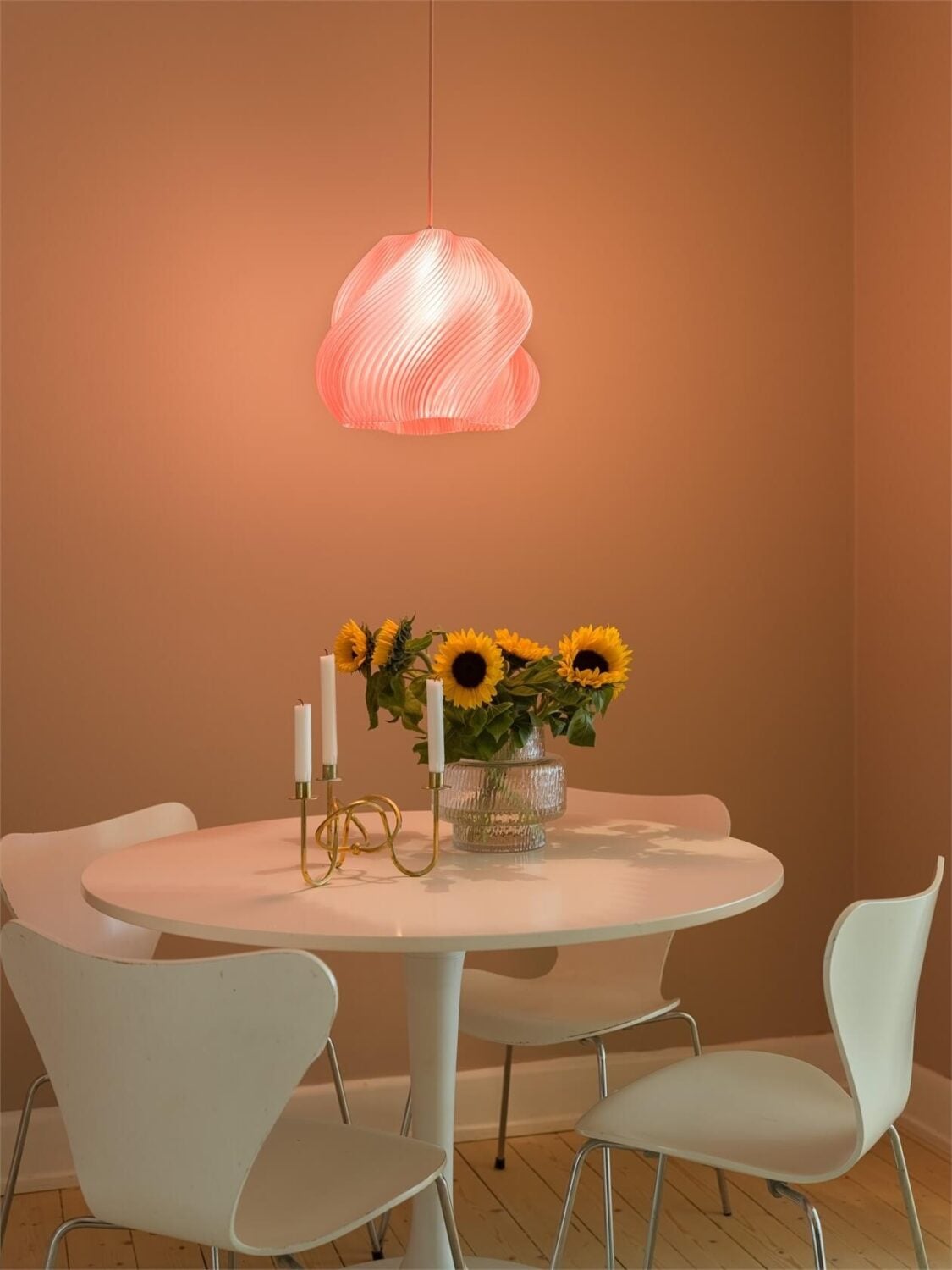 Colorful and Light Rooms in a Swedish One-Bedroom Apartment 7 white round dining space