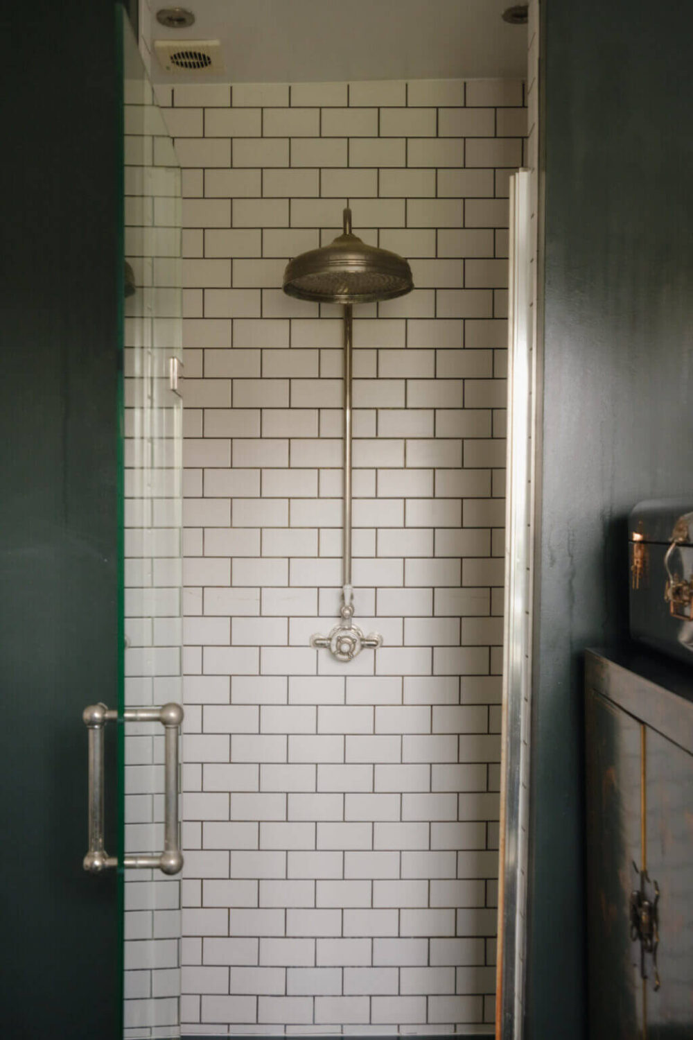 Nature-Inspired Colors in an Extended East London Home 16 white tiled shower