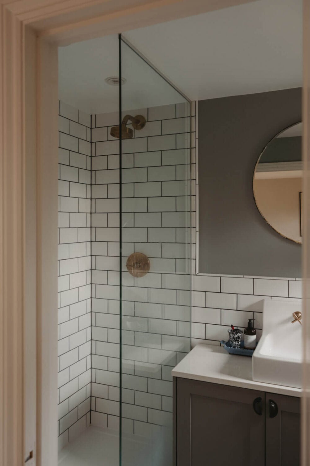 Original Details and a Modern Extension in a London House 32 white tiles and gray walls vanity bathroom