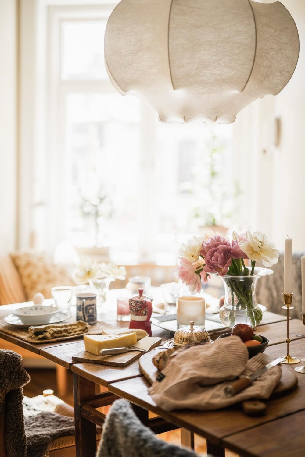 Hannes Mauritzson's Warm Yellow Hygge Apartment in Sweden 20 wooden kitchen table