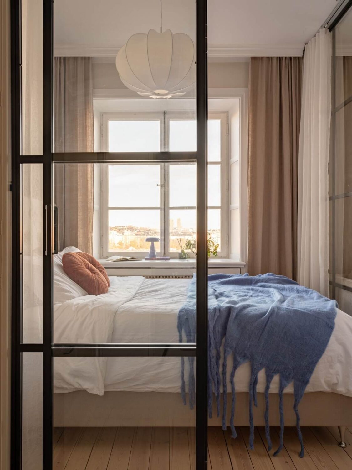 A Small and Serene Apartment with an Industrial Glass Bedroom 13 MEDF7FBE5943E9240AD99CD8CCA4511E39B 20241108090848 w2200 q80 A Small and Serene Apartment with an Industrial Glass Bedroom