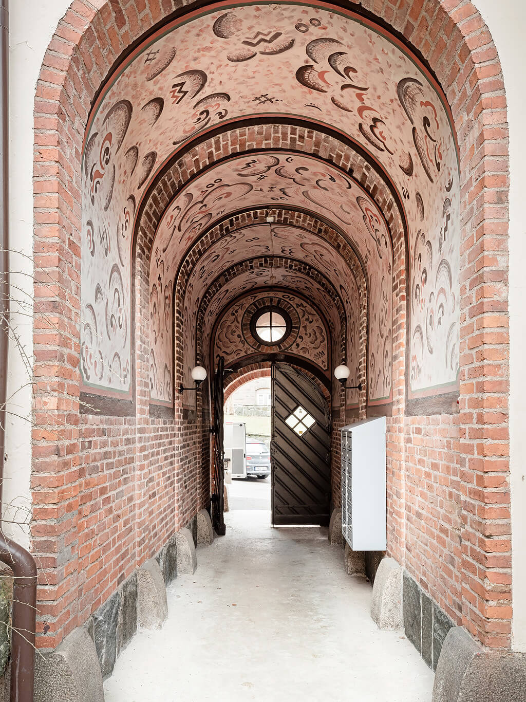 A Swedish Attic Apartment with a Lovely Balcony Overlooking the City 19 apartment building entrance