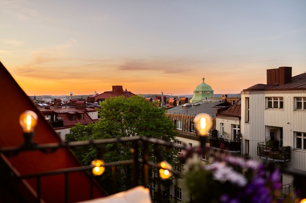 A Swedish Attic Apartment with a Lovely Balcony Overlooking the City 16 balcony view