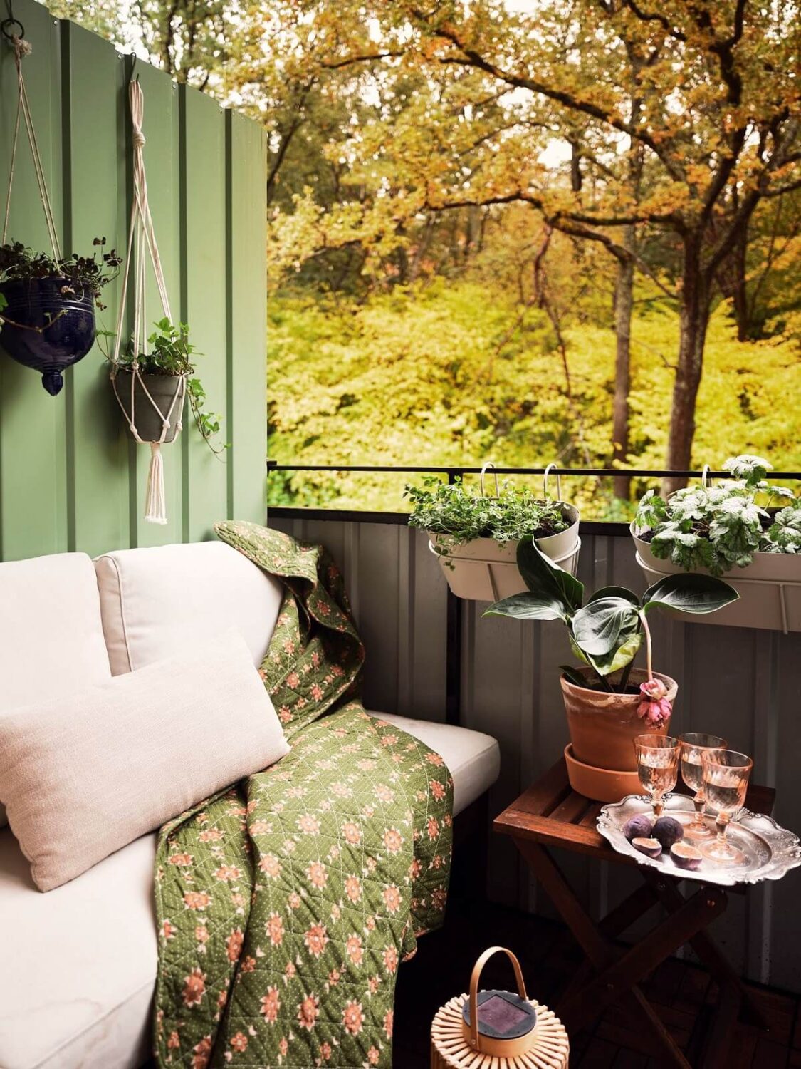 A Small Swedish Apartment with a Social and Semi-Open Floorplan 7 balcony with view of nature