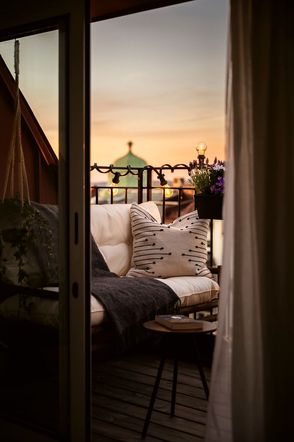 A Swedish Attic Apartment with a Lovely Balcony Overlooking the City 15 balcony