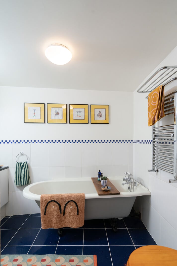 Colorful Rooms and Period Features in a London Terrace House 20 bathroom blue floor tiles