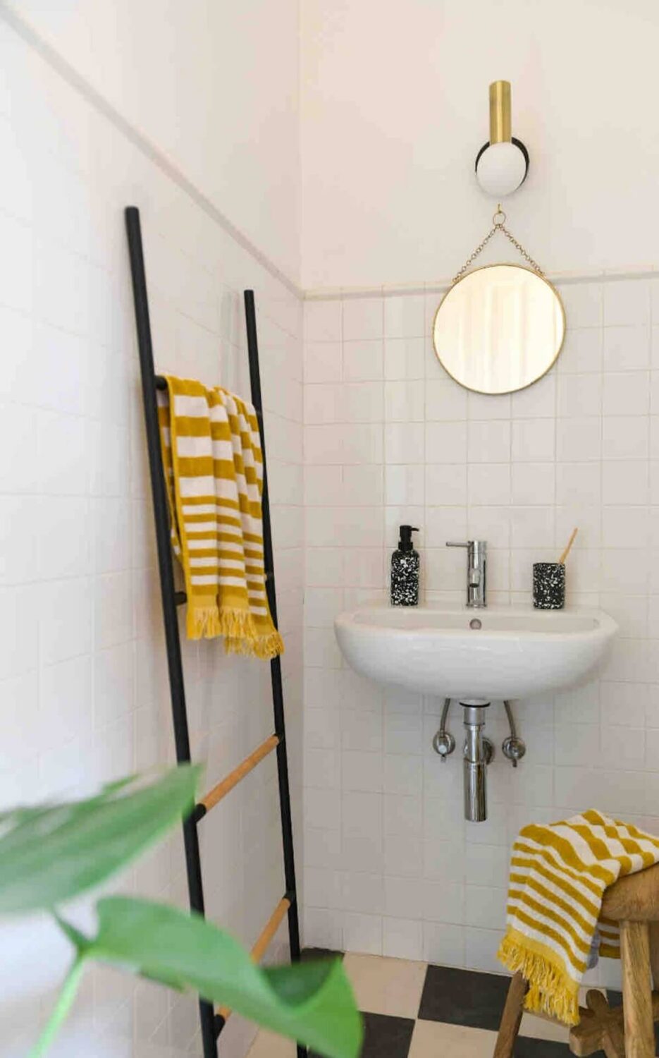 A Colorful Airbnb Apartment in Portugal 14 bathroom checkerboard floor A Colorful Airbnb Apartment in Portugal