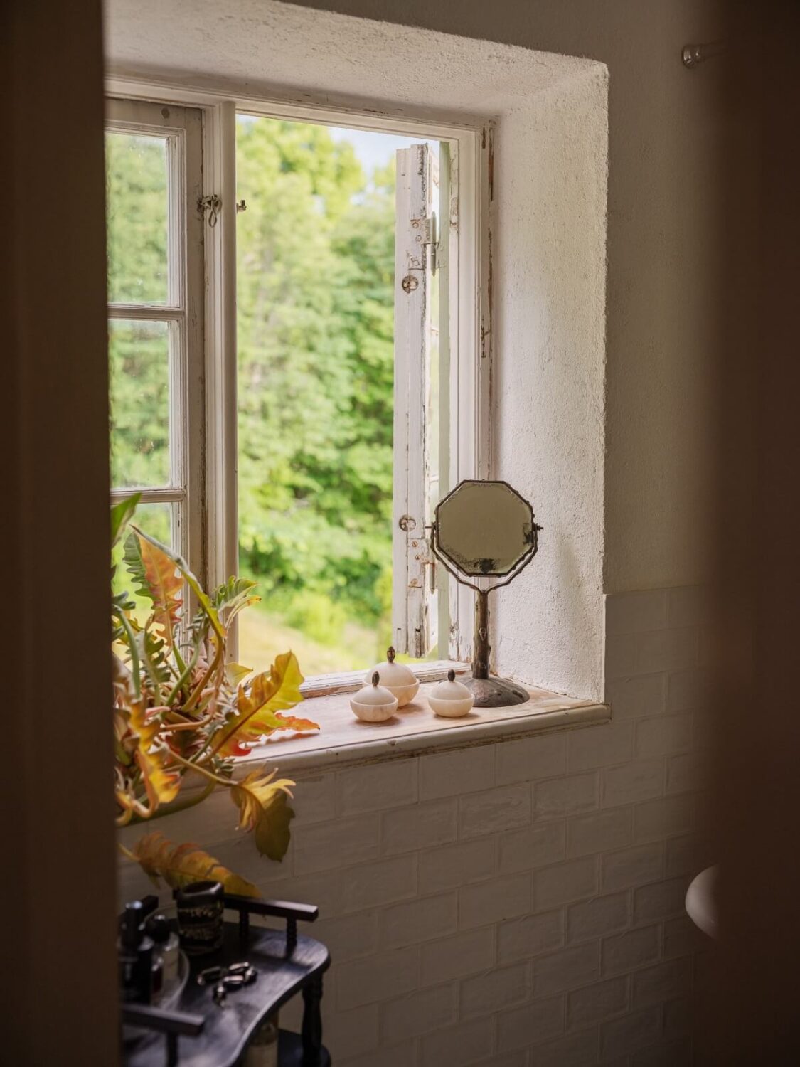 A Bohemian-Style House on the Estate of a Swedish Castle 22 bathroom window