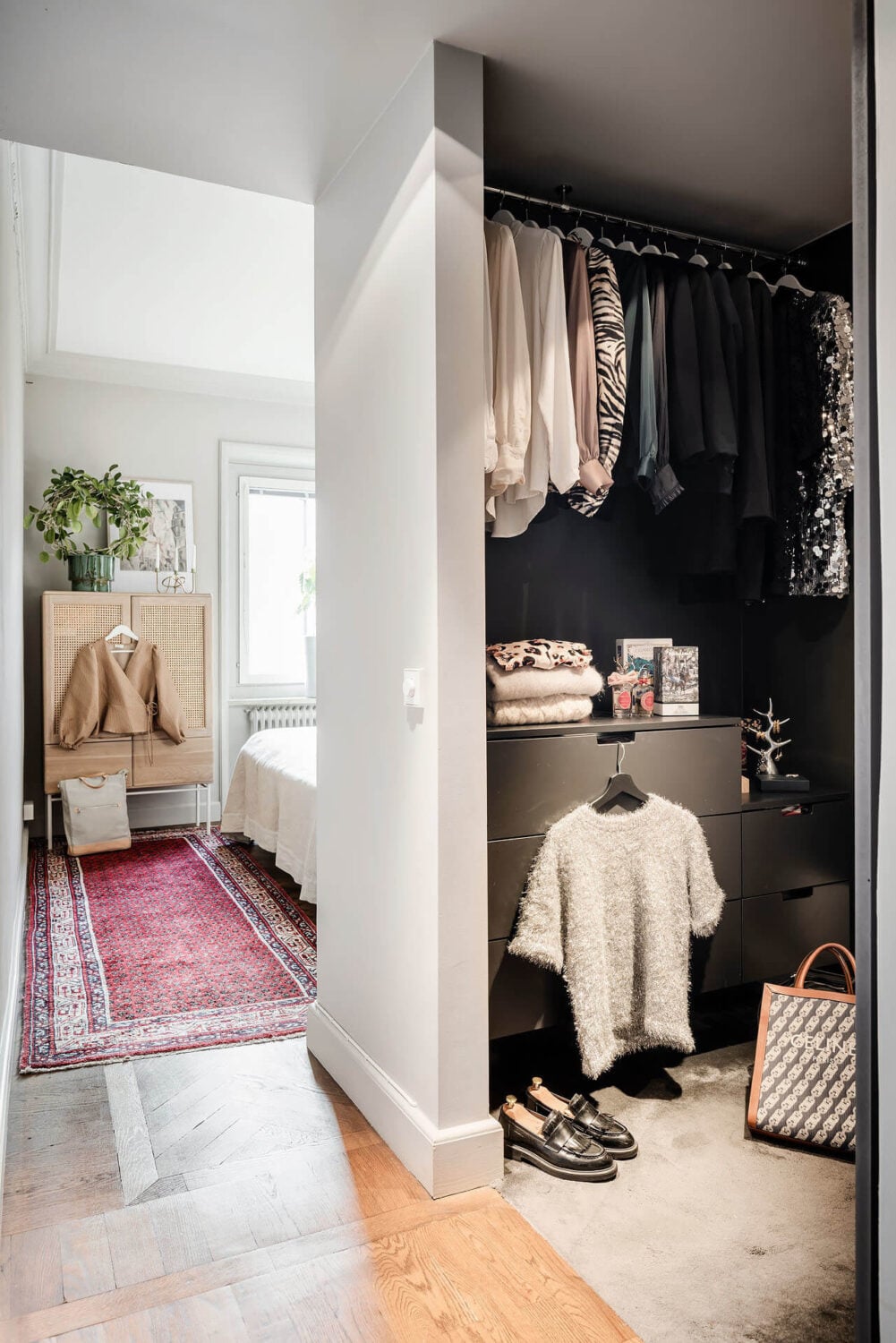 A Burgundy Kitchen in a Stylish Scandinavian Apartment 21 bedroom walk in closet