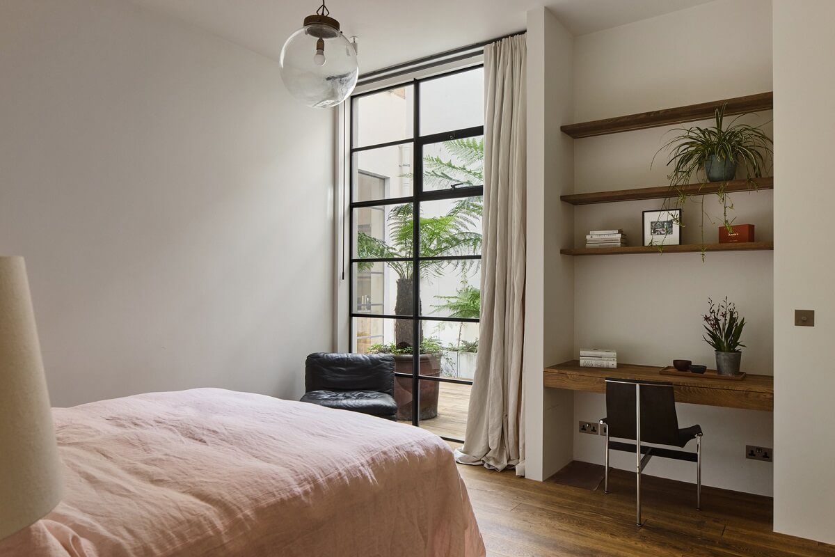 A Grand Industrial Warehouse Conversion in London 37 bedroom with built in desk