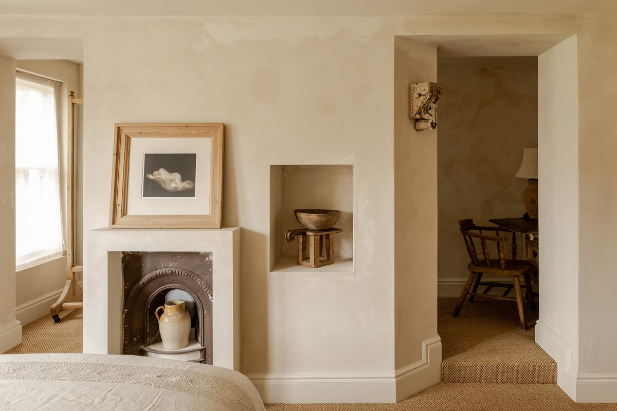 Serene Spaces with Limewash Walls in an English Victorian Home 16 bedroom with fireplace