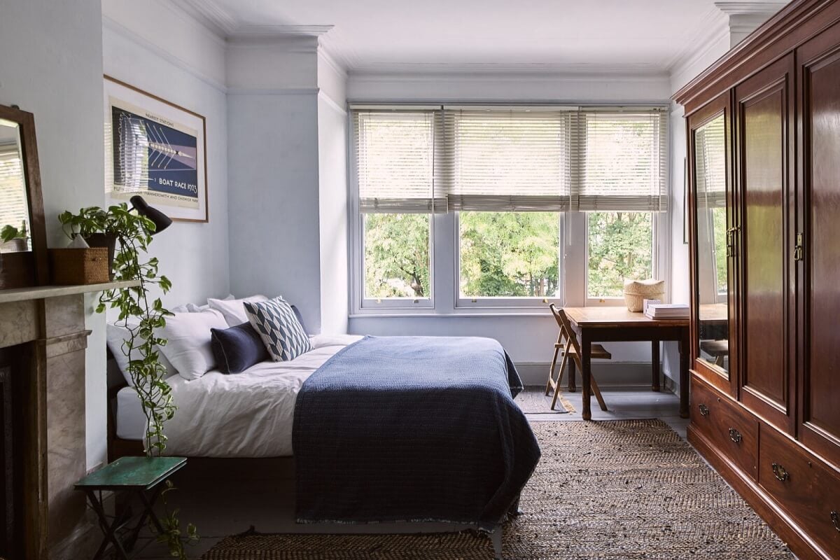 A Grand Victorian House with Many Period Features and a Lush Garden 16 bedroom with large wooden wardrobes