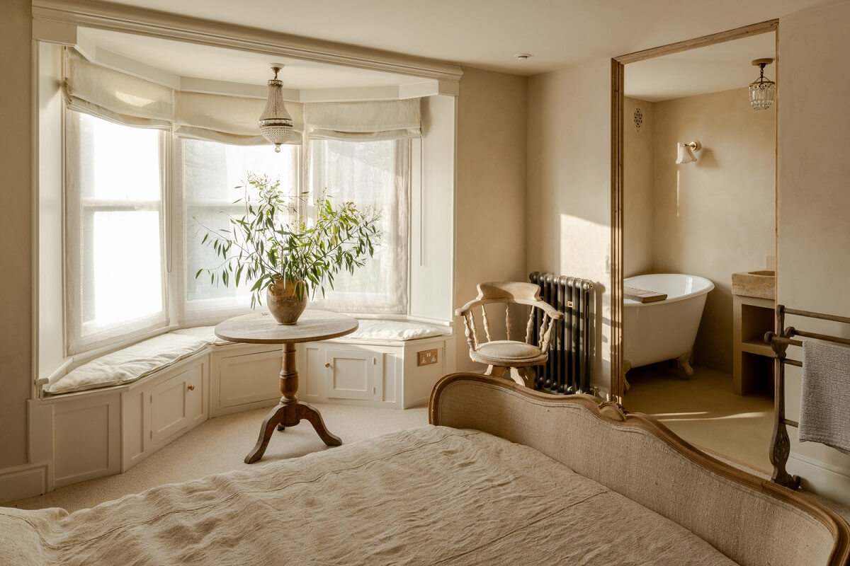 Best of 2024: Bedrooms 12 bedroom with limewash wallsbay window and en suite bathroom