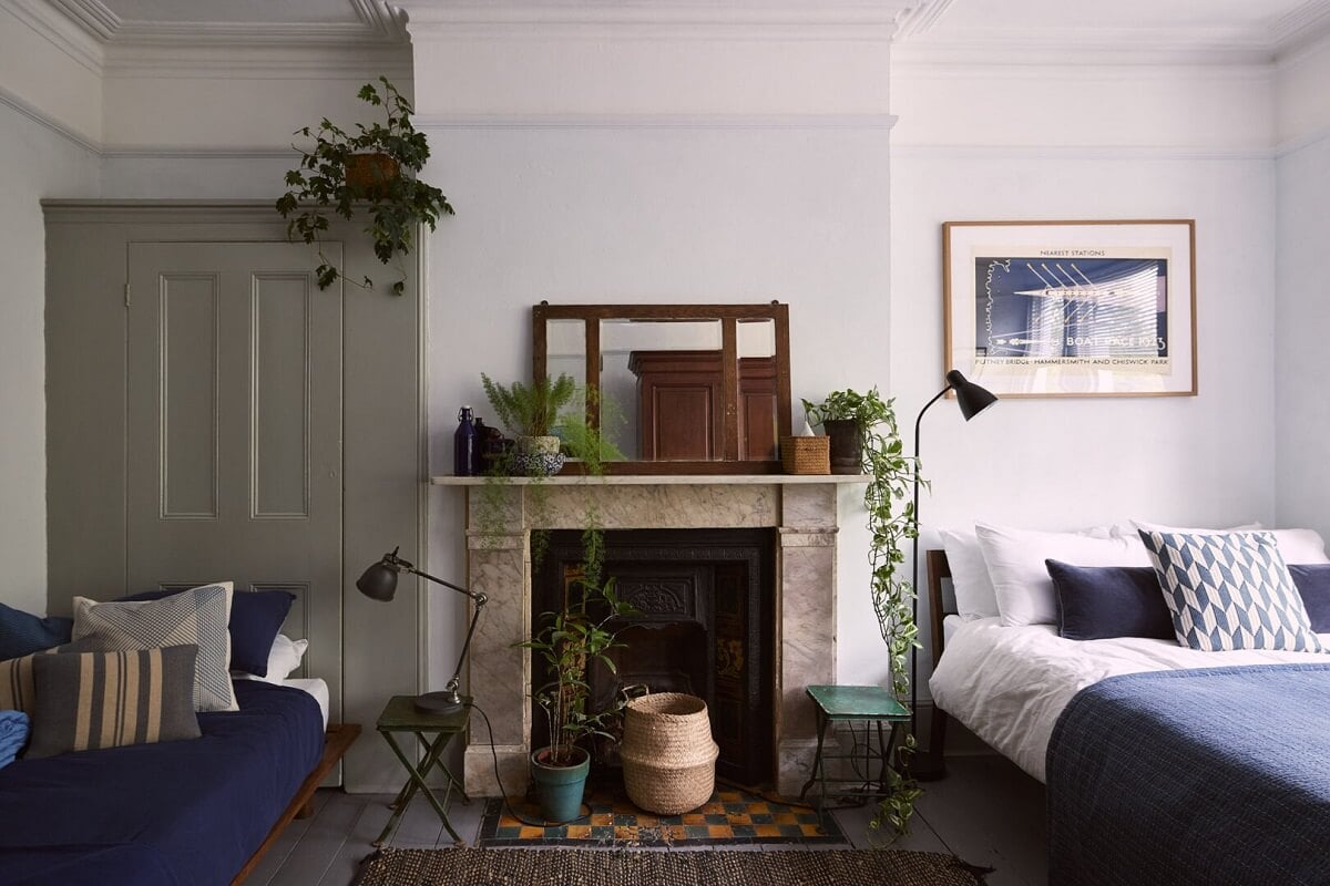 A Grand Victorian House with Many Period Features and a Lush Garden 15 bedroom with seating area and fireplace