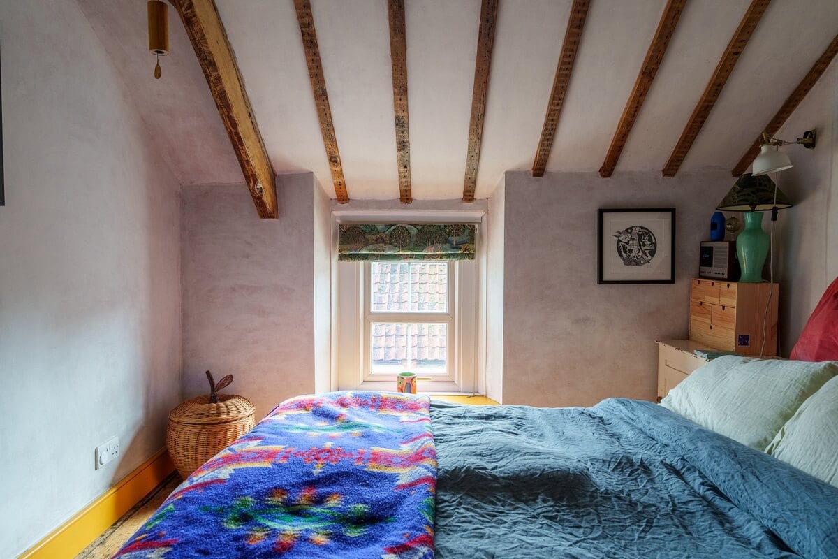Colorful Furniture in a Historic English Cottage 17 bedroom wooden ceiling beams