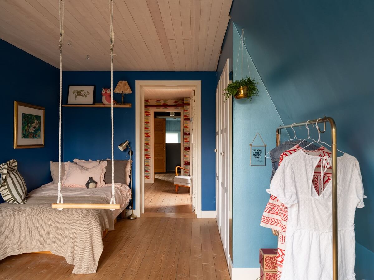 A 1930s Green-Painted Wooden Family Home in Sweden 19 blue bedroom with swing