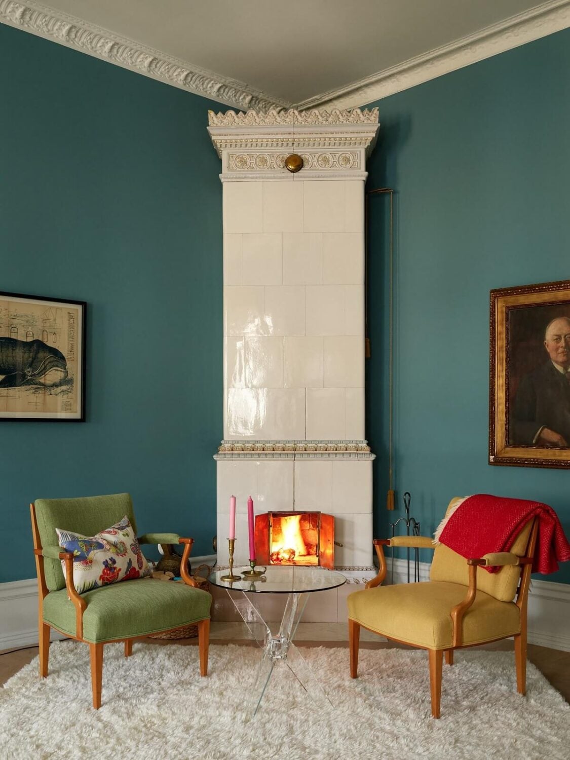 A Colorful Turn-of-the-Century Family Apartment in Stockholm 5 blue living room white fireplace