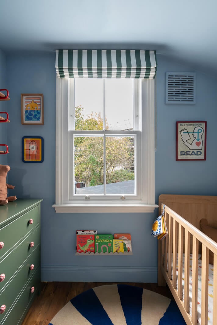 Colorful Rooms and Period Features in a London Terrace House 17 blue nursery with striped curtains