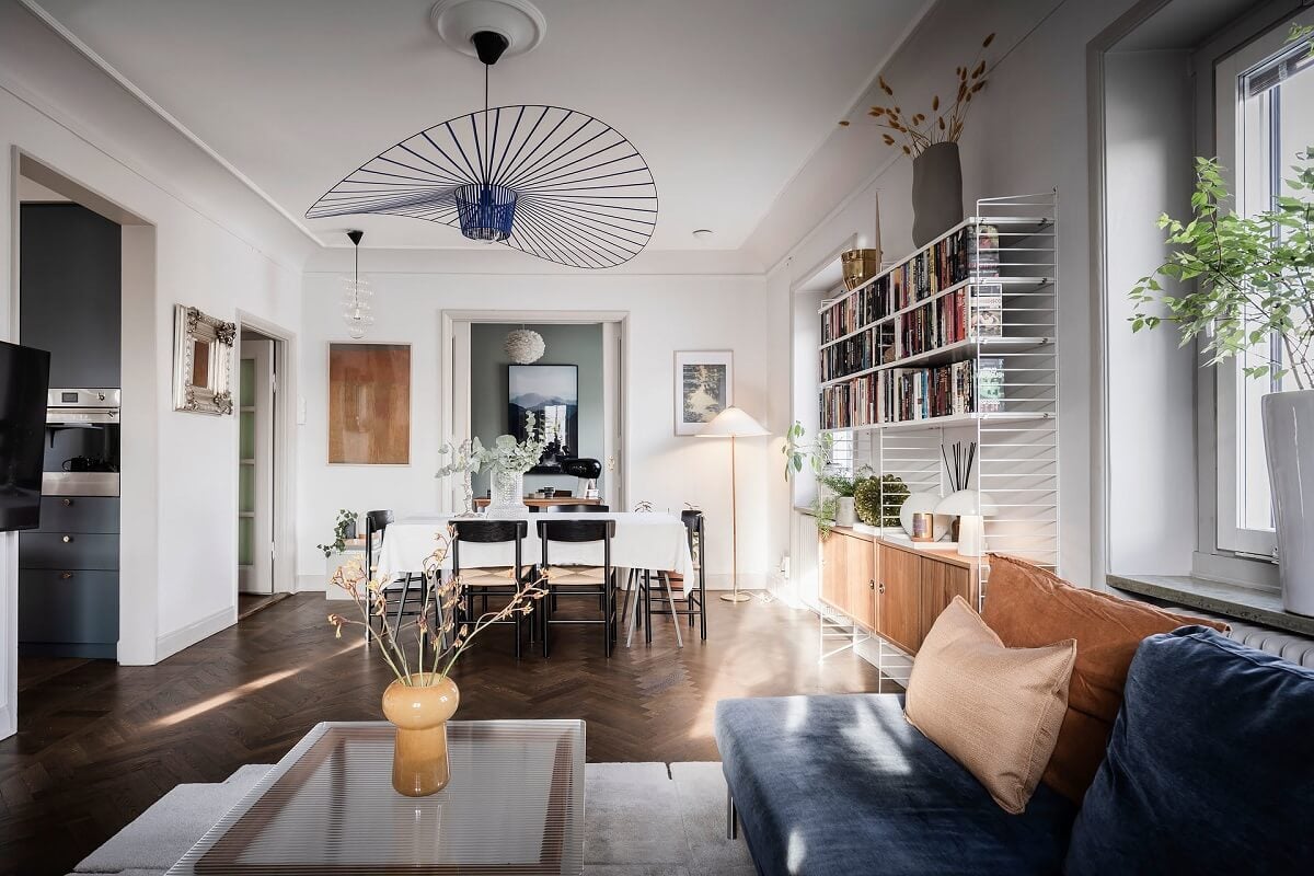 A Burgundy Kitchen in a Stylish Scandinavian Apartment 2 blue pendant living room blue sofa