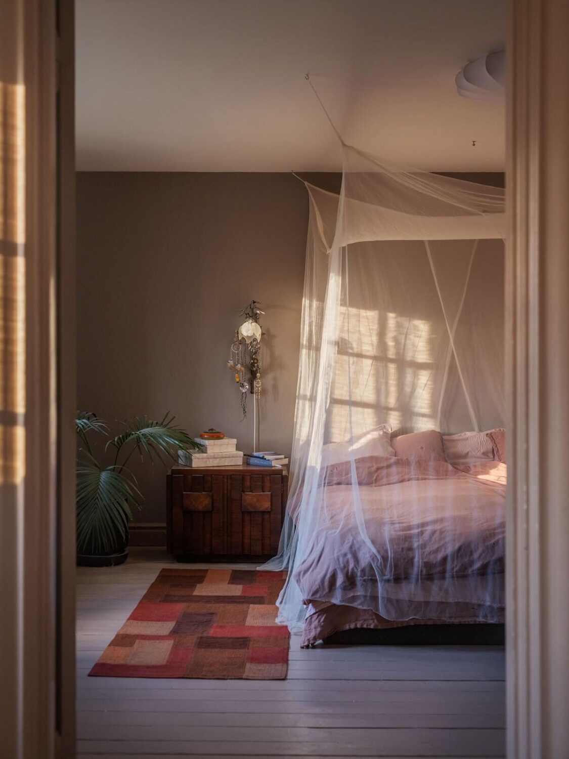 A Bohemian-Style House on the Estate of a Swedish Castle 16 bohemian bedroom painted floorboards
