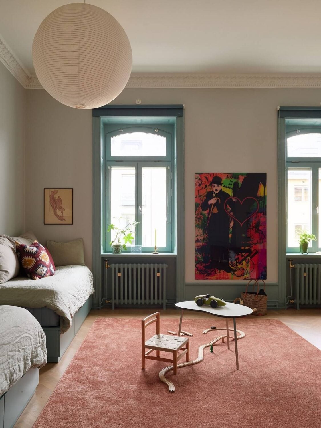 A Colorful Turn-of-the-Century Family Apartment in Stockholm 9 childrens room double beds large pink rug