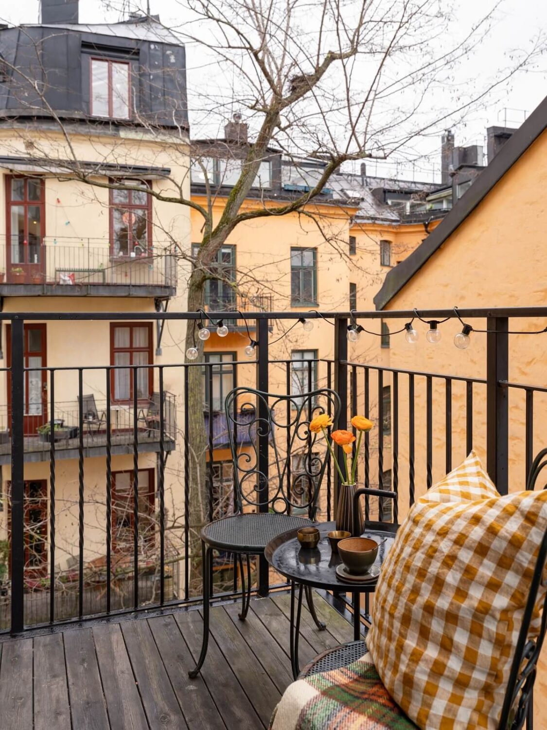 A Swedish Maisonette with Period Features and Modern Solutions 23 courtyard balcony 1 A Swedish Maisonette with Period Features and Modern Solutions