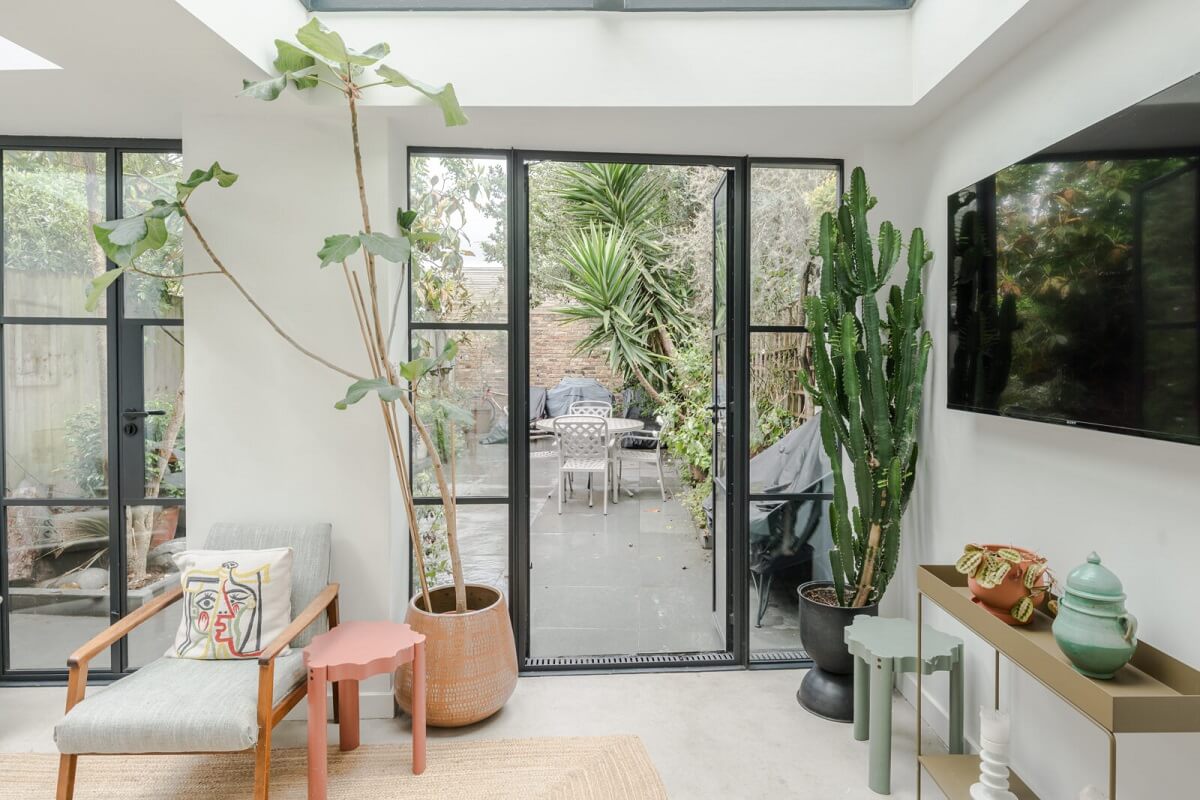 A Bright Extended and Renovated Victorian House in London 8 crittal windows garden access