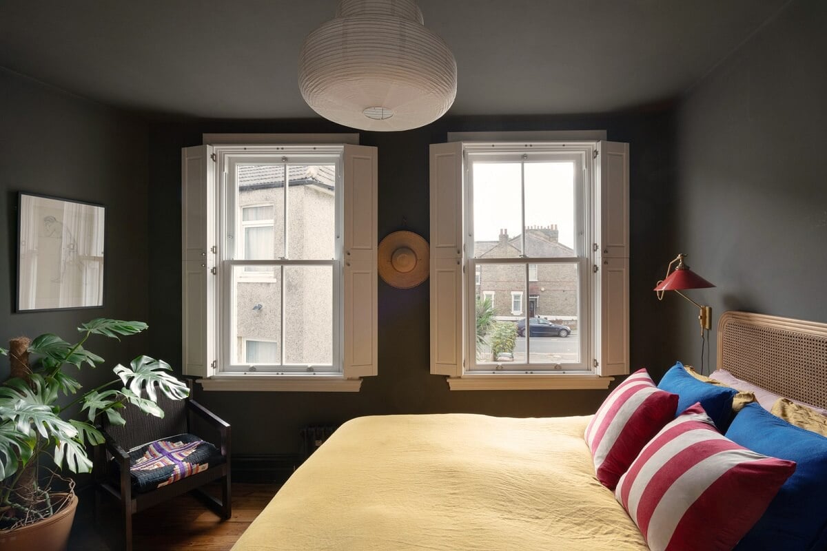 Colorful Rooms and Period Features in a London Terrace House 12 dark gray color drenched bedroom