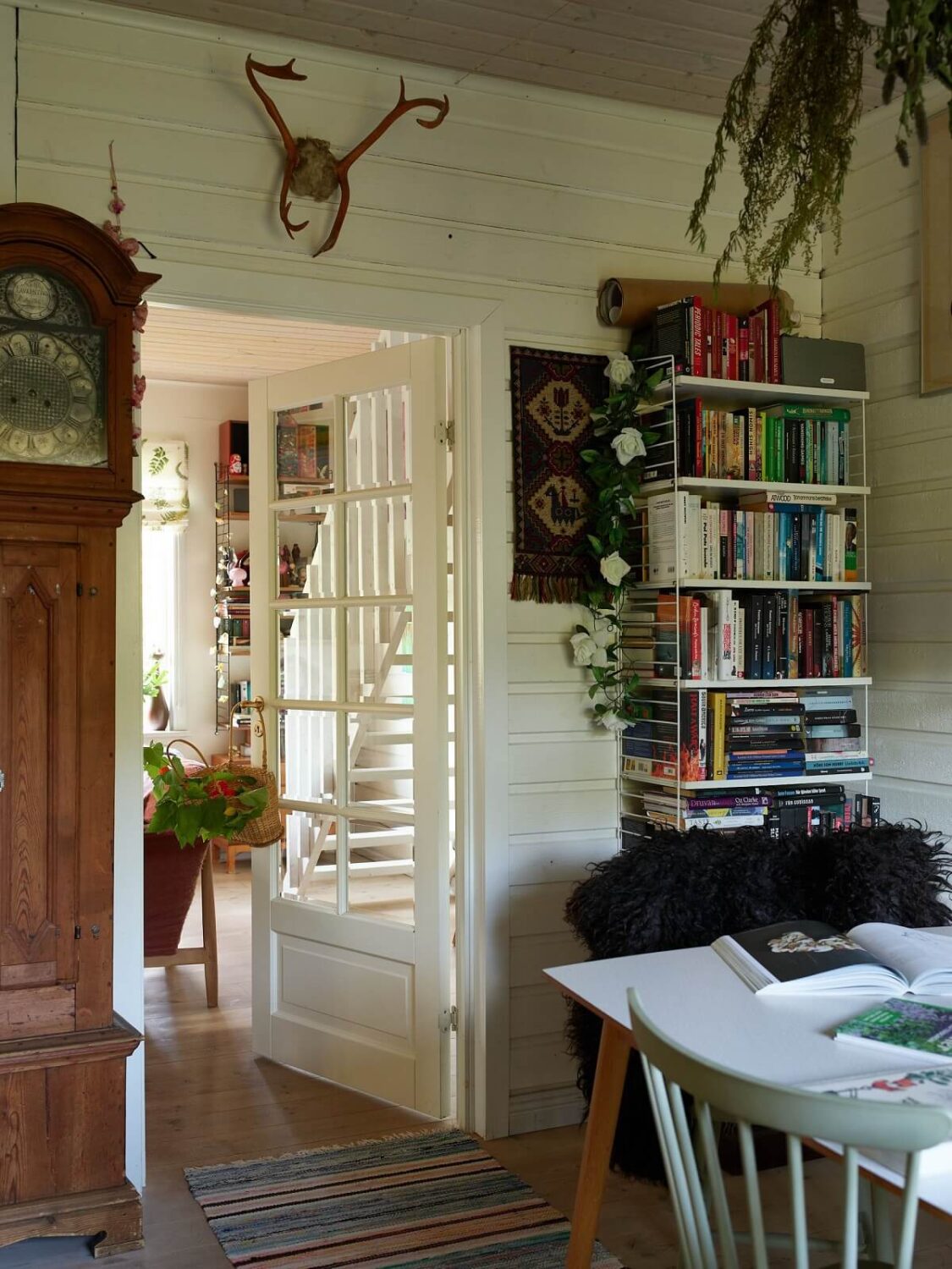 Best of 2025: Dining Rooms 7 dining room striped rug bookshelves