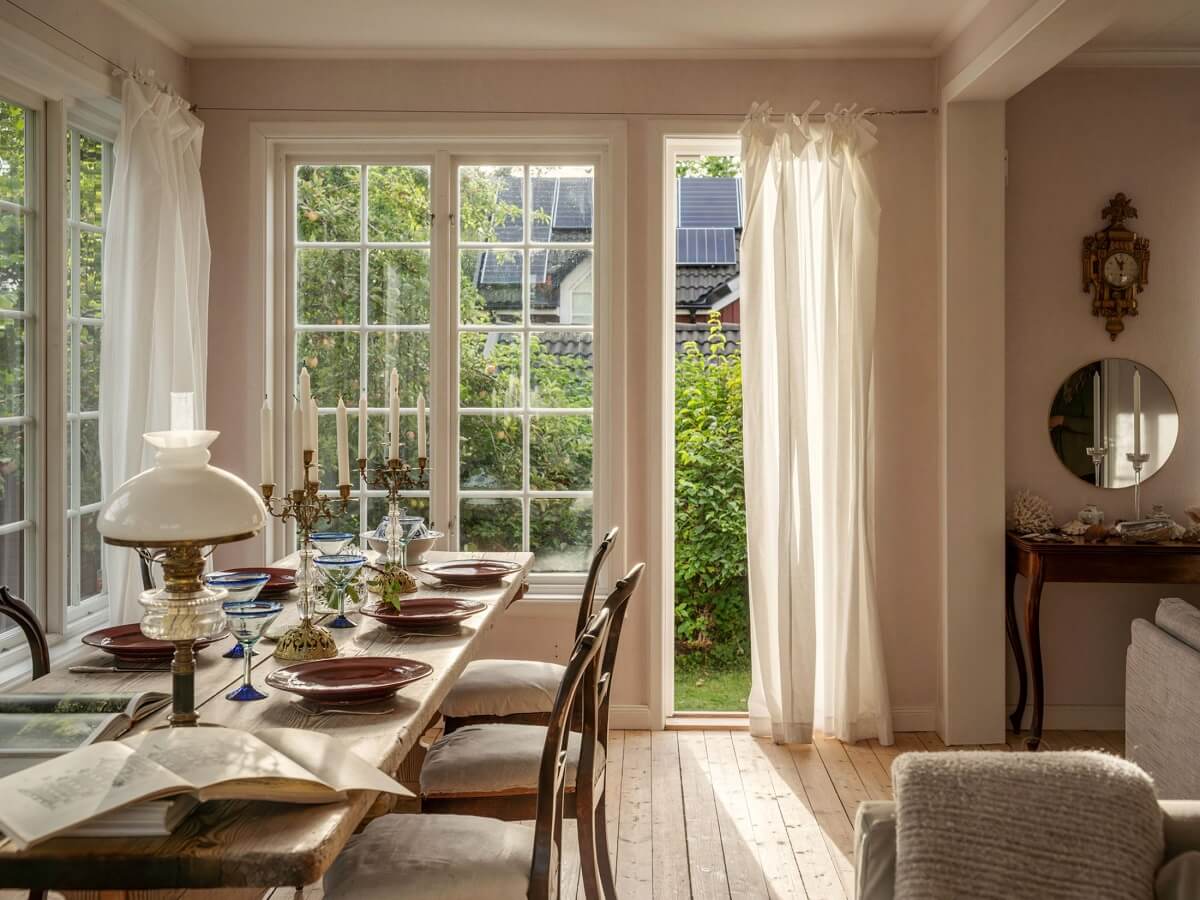 A Romantic 1920s Villa with Views of the Lake 6 dining room with garden access