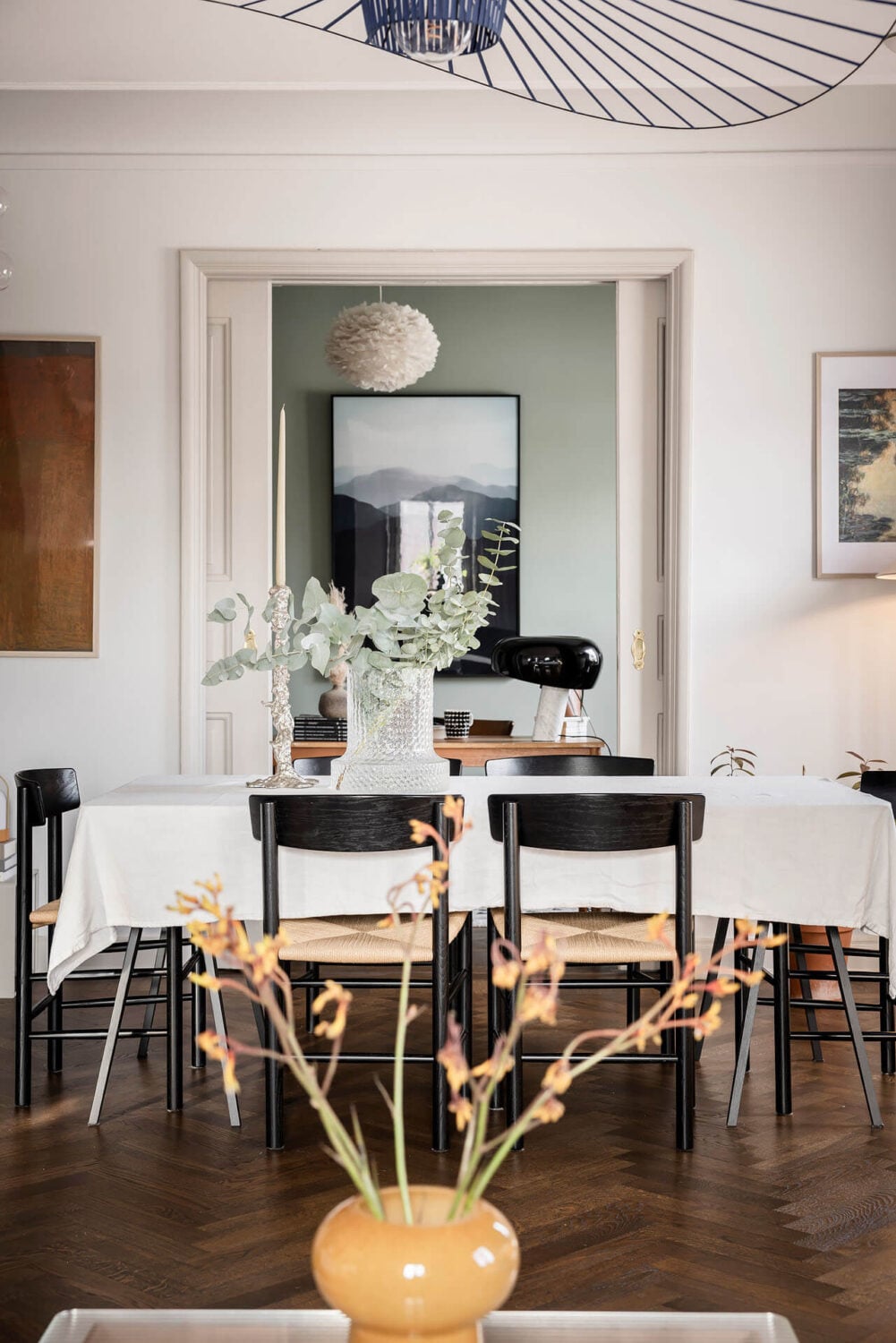 A Burgundy Kitchen in a Stylish Scandinavian Apartment 7 dining table in living room