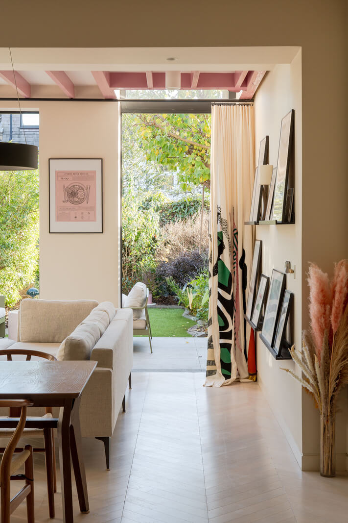 A Colorful Edwardian Family Home in London 10 extended sitting room pink beams