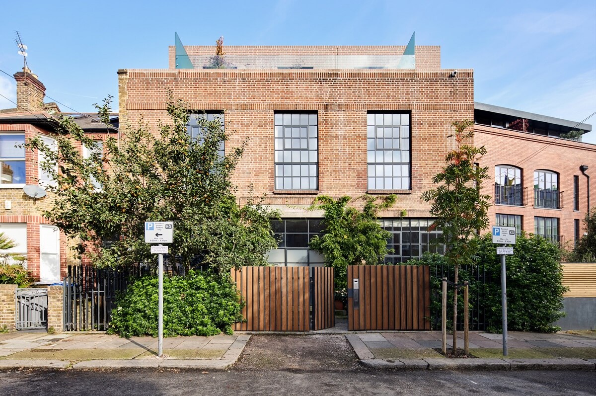 A Grand Industrial Warehouse Conversion in London 42 exterior pember house wood entrance gate