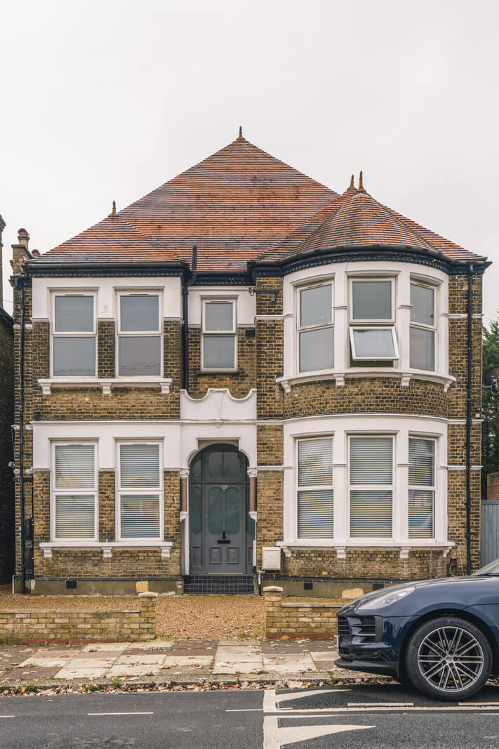 A Grand Ground Floor Apartment with Dark Blue Walls and a Garden 21 exterior victorian house with bay window