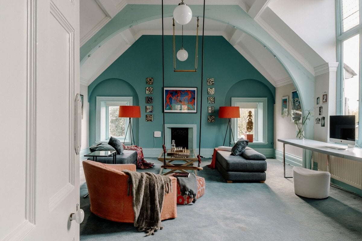 A Grand Arts and Crafts House in London 20 family room teal blue accent wall