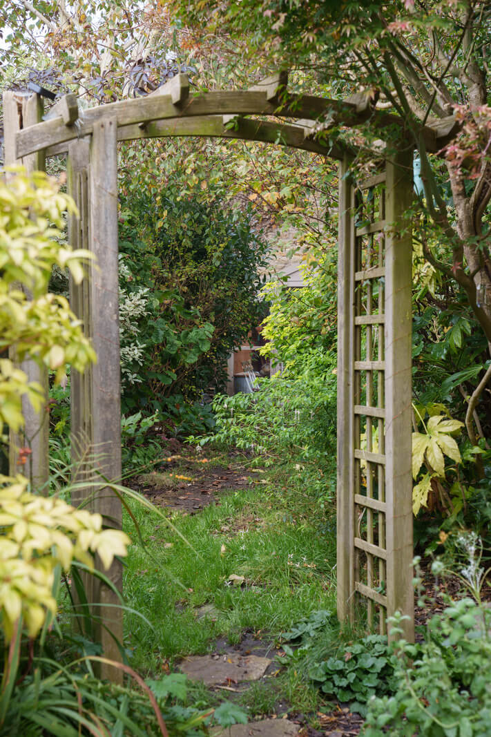 Colorful Furniture in a Historic English Cottage 19 garden arch cottage england Colorful Furniture in a Historic English Cottage