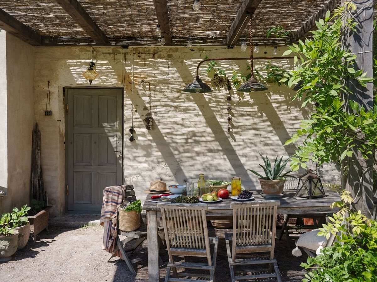 A Bohemian-Style House on the Estate of a Swedish Castle 26 garden dining area