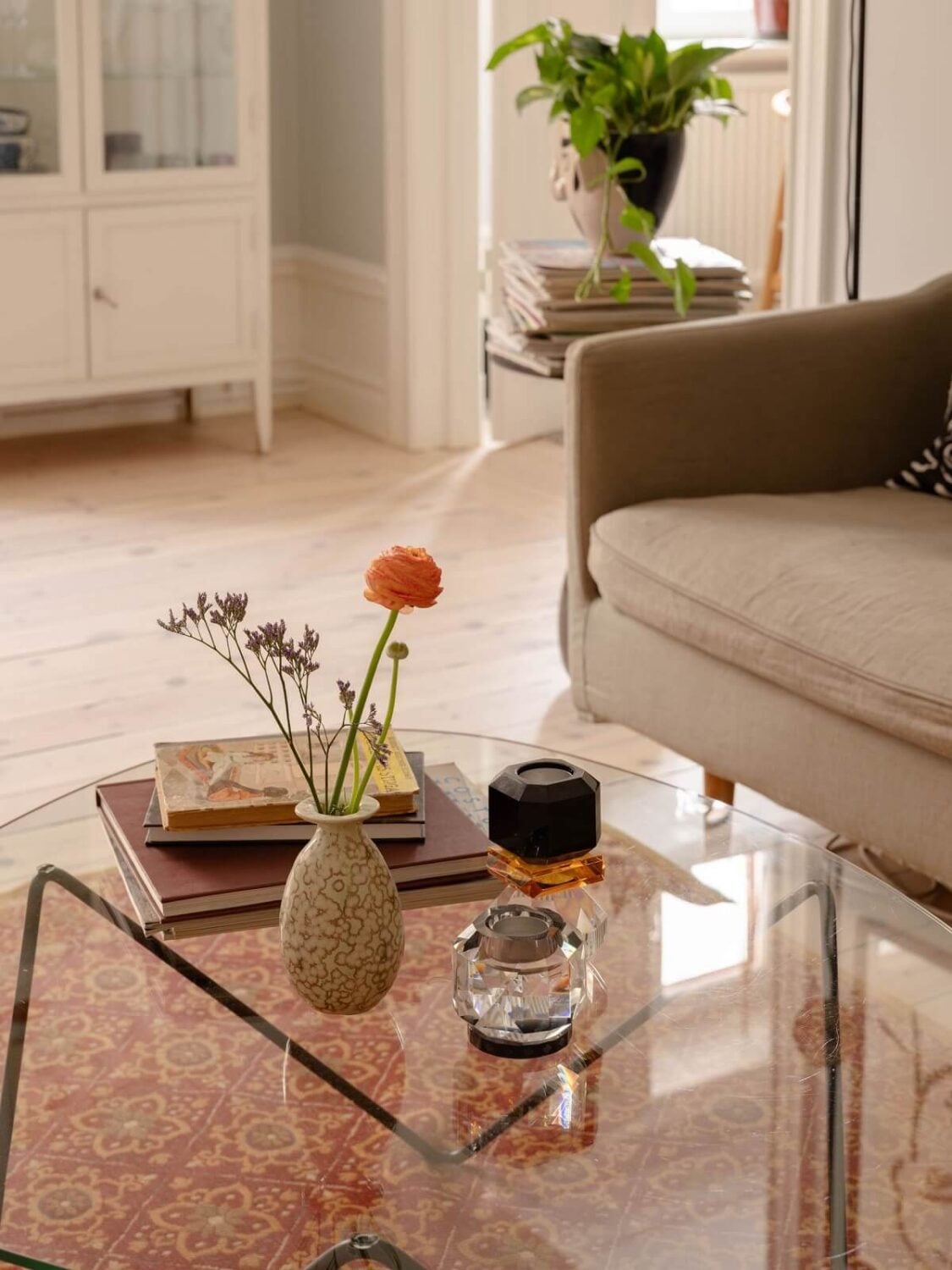 A Spacious Stockholm Apartment with Light Gray Walls 4 glass coffee table