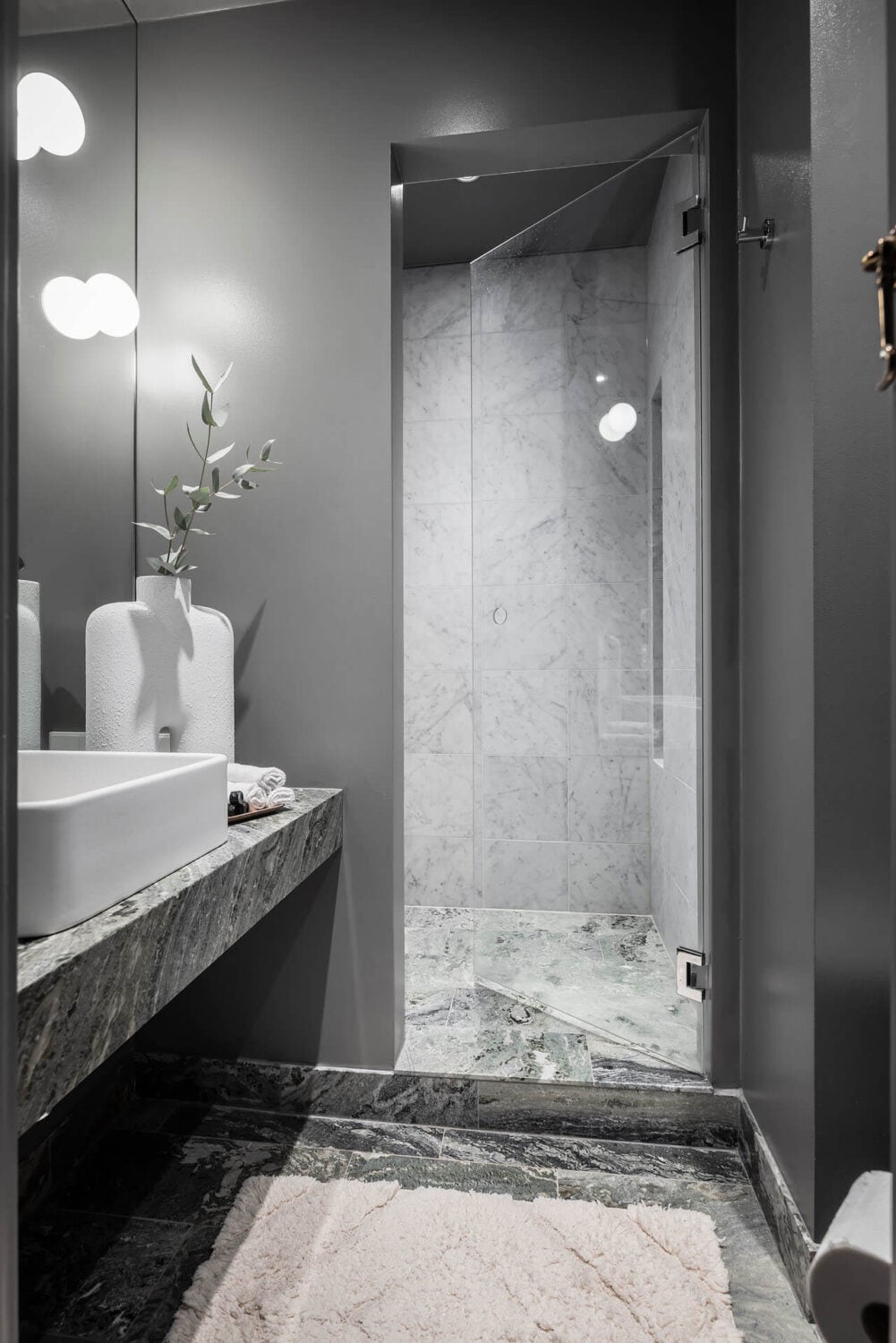 A Burgundy Kitchen in a Stylish Scandinavian Apartment 25 gray bathroom marble tiles