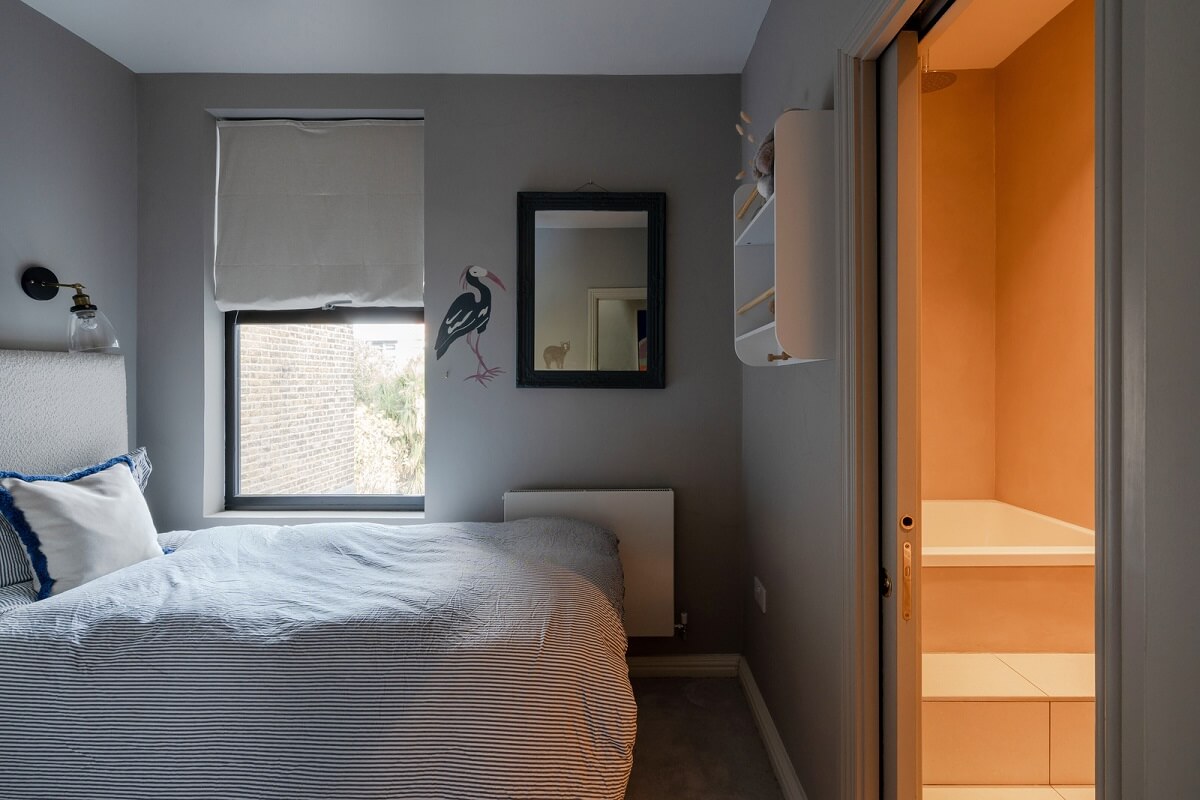 A Colorful Edwardian Family Home in London 21 gray bedroom
