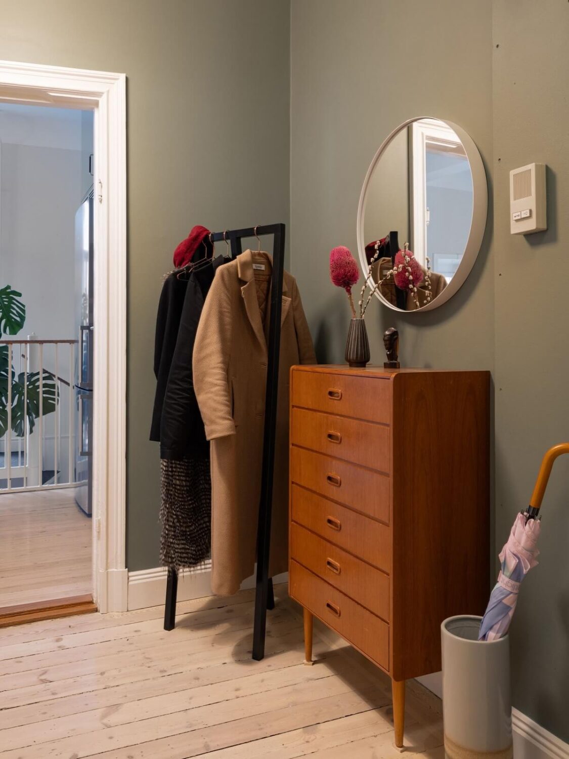 A Swedish Maisonette with Period Features and Modern Solutions 21 gray hallway