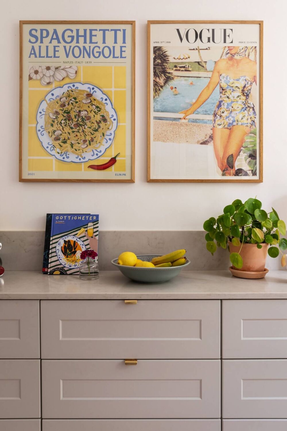 Soft Colors in a Charming Corner Apartment in Stockholm 15 gray kitchen cabinets