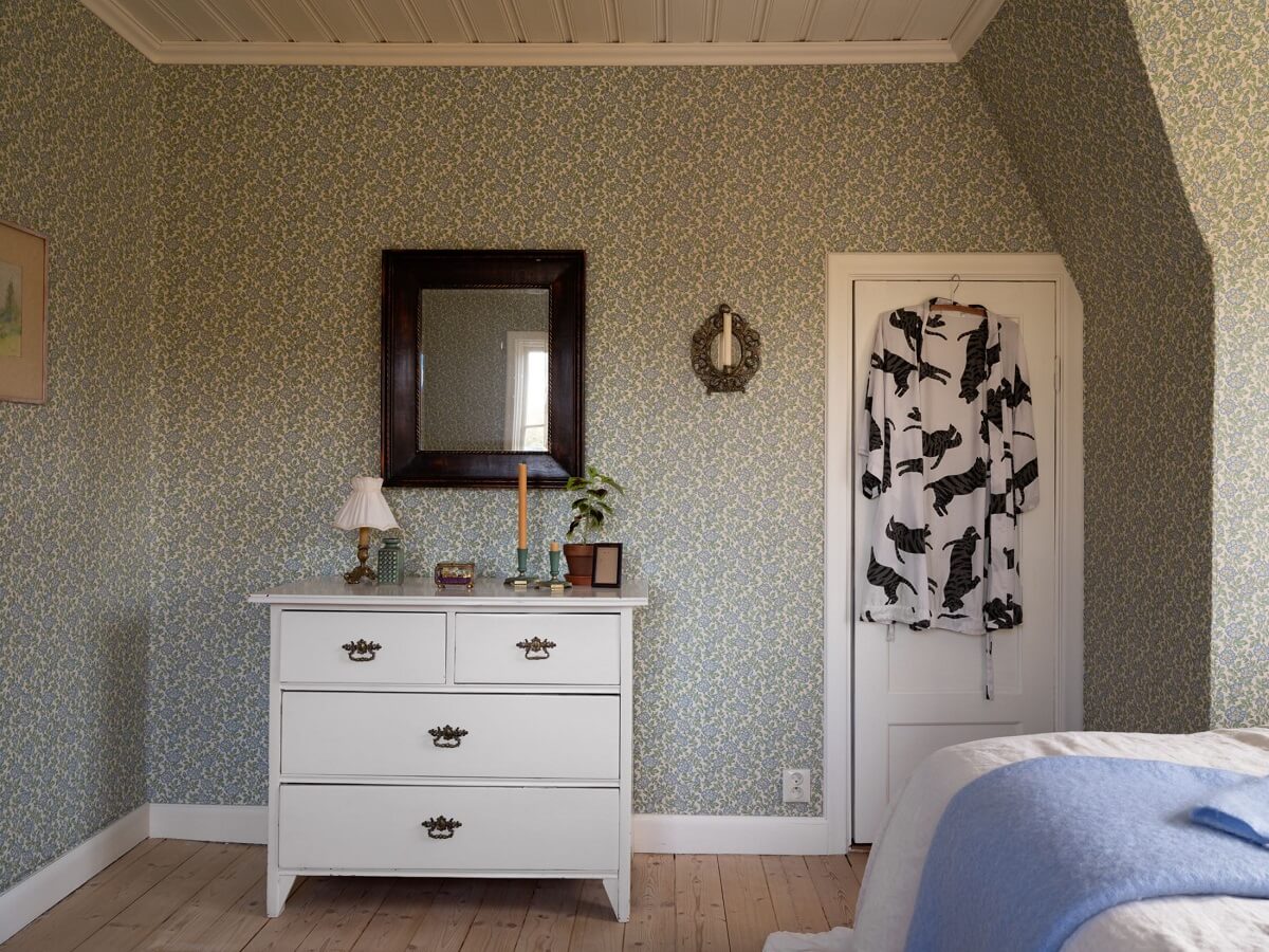 A 1930s Green-Painted Wooden Family Home in Sweden 14 gray master bedroom
